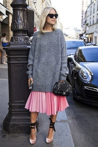 Effortless Elegance in a Soft Pink Cardigan and Midi Skirt