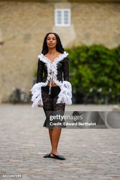 Street Style Edge with Leather Pants and Patterned Cardigan