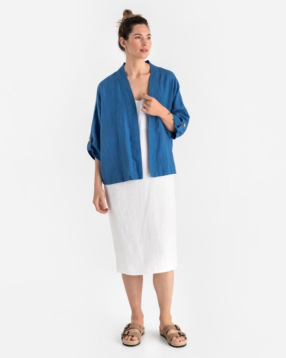 Effortless Layers: Lightweight Cardigan Over Neutral Bermudas