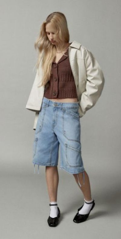 Urban Chic: Leather Jacket and Slim-Fit Bermuda Shorts