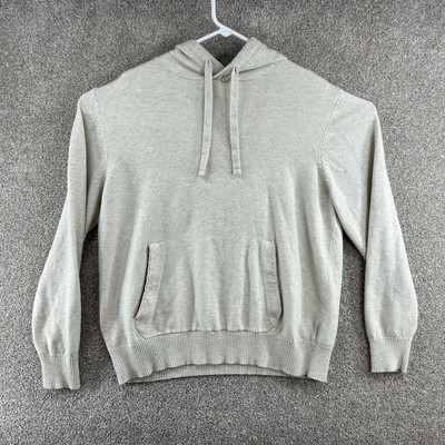 Sleek Monochrome Look with White Pants and Ivory Sweater