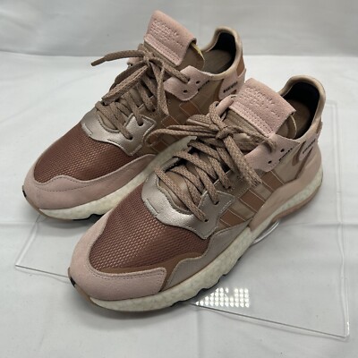 Athleisure Glam in White Joggers and Metallic Sneakers