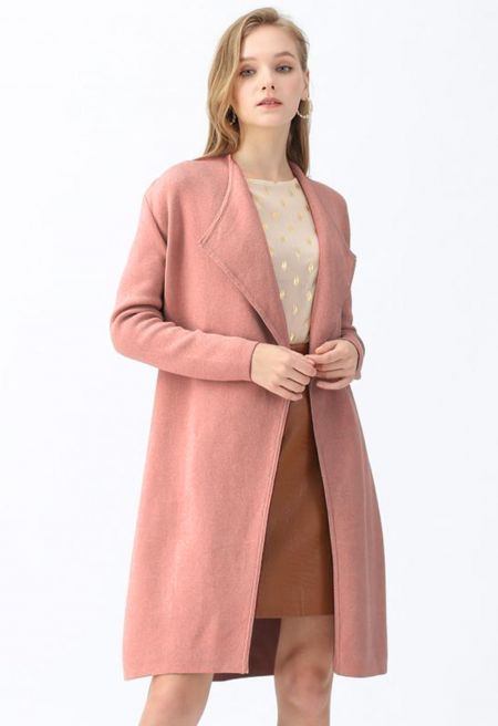 Chic Layering: Pink Pants with Longline Camel Coat