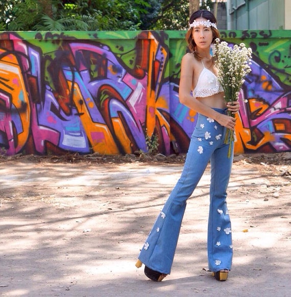 Boho Vibes with Embroidered Sweater and Flared Jeans