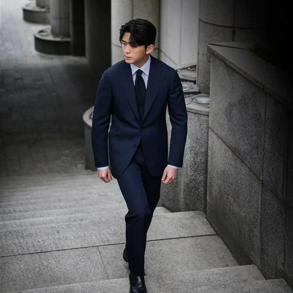 Sharp and Sleek: The Classic Navy Suit with a Twist