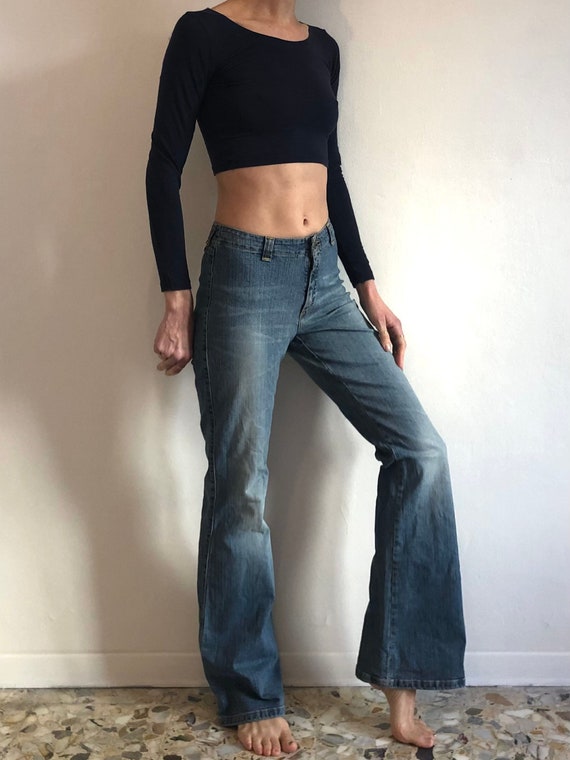Shiny Metallic Halter Tops with Low-Rise Wide Leg Jeans
