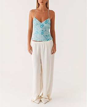 Baby Pink Cardigan Over a Sparkly Camisole and Flared Pants