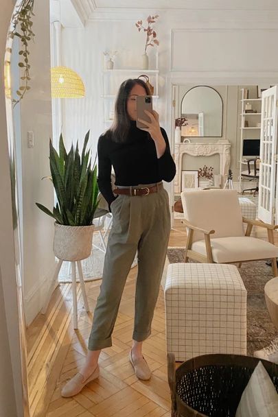 Sleek and Modern: Black Turtleneck with Tailored Khakis