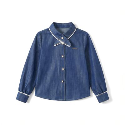Classic Denim Jacket Layered Over Collared Blouse