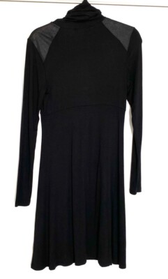 Monochrome Magic: Black Poplin Skirt and Sleek Turtleneck