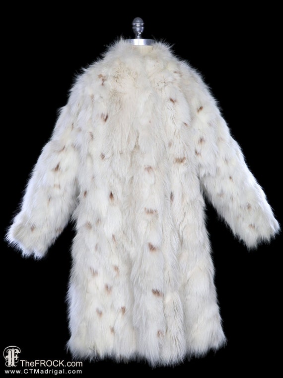 Monochrome Magic with Ivory Faux Fur Coats