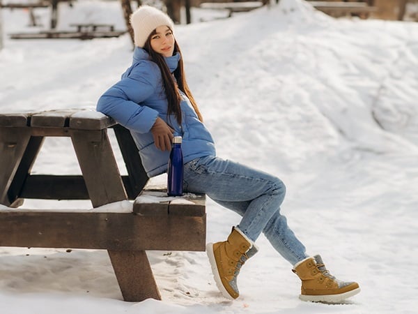 Minimalist White Snow Boots Combined with Pastel Knit Dresses