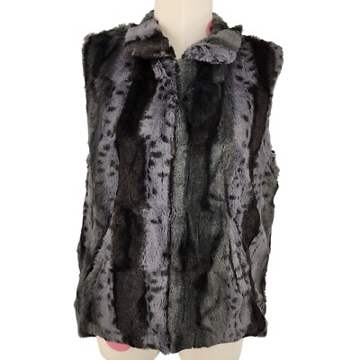 Faux Fur Vest Styling Over a Sleek Black Dress