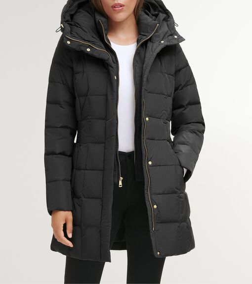Down-Filled Drama: Oversized Puffer with Statement Gloves