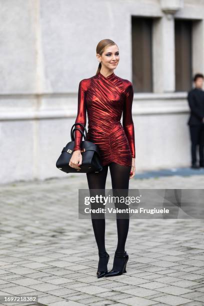 Monochrome Magic: All-Black Ensemble with Glossy Tights