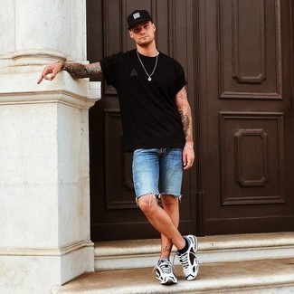 All-Black Everything: Black Jean Shorts and Sleek Sneakers