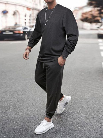 Monochrome Magic: All-Black Joggers and Oversized Hoodie