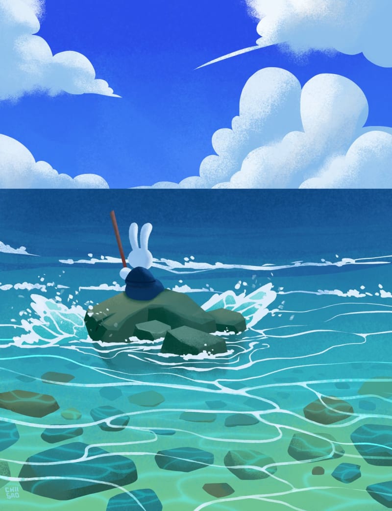 Little bunny on a rock in the sea