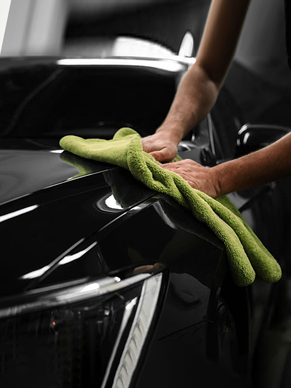 Red Car with Water Droplets
