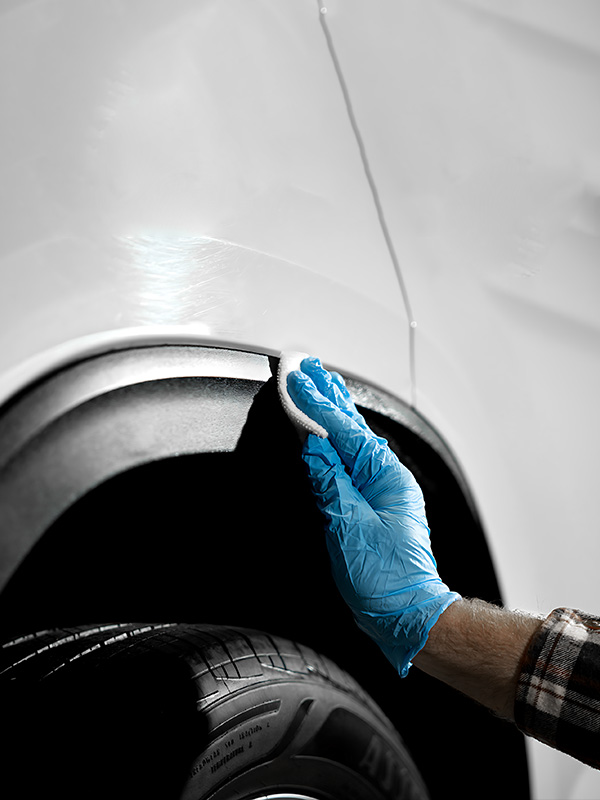 Red Car with Water Droplets