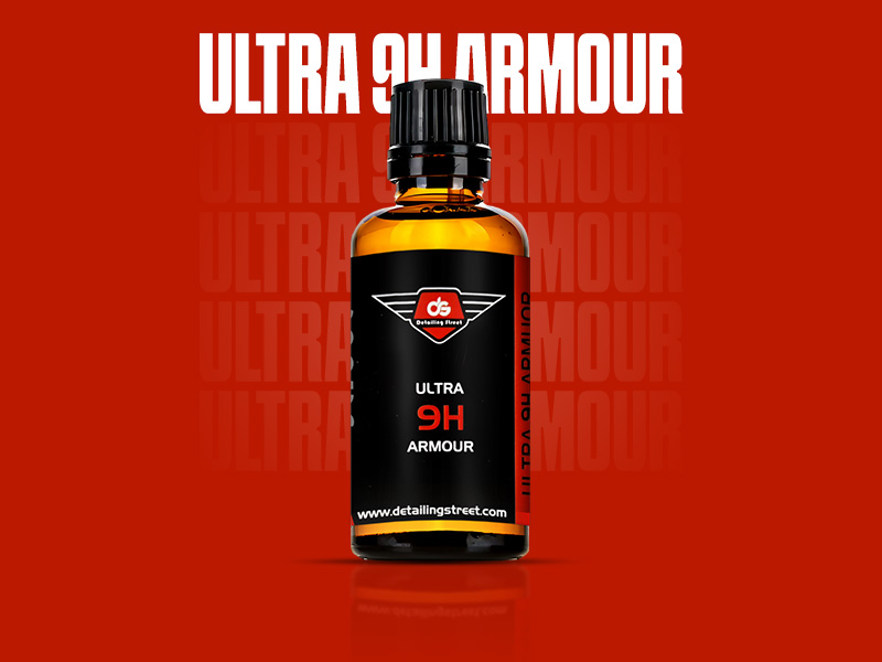 Red Car with Water Droplets