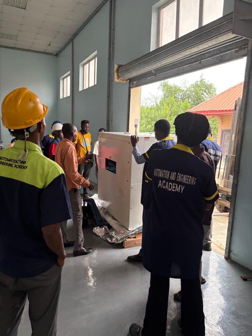 The engineering team inspecting a rebuilt unit