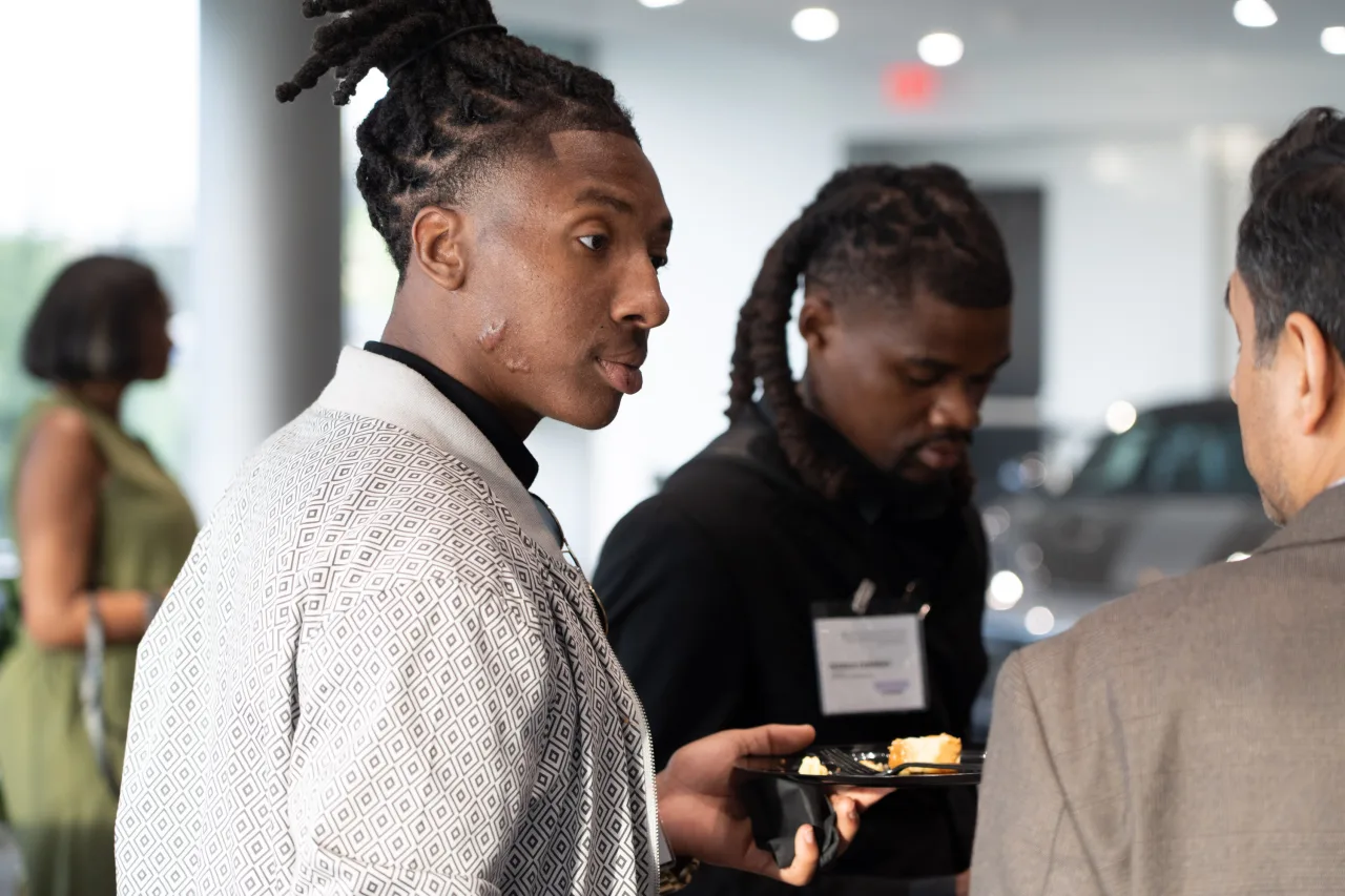 A photo of Tim Outing, Dedrick Conway