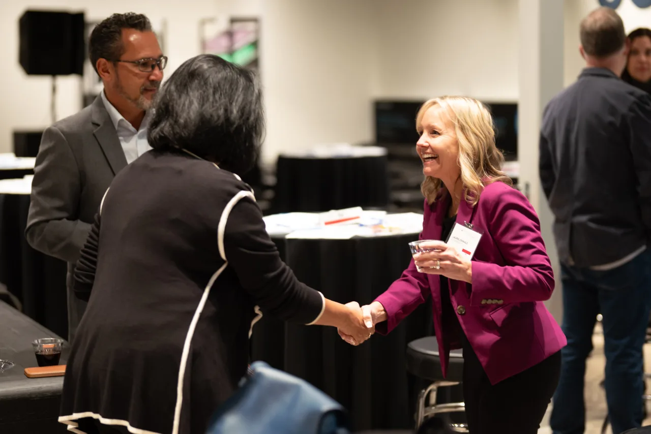A photo of Frank Trampert, Madhuri Kumar, and Laurie Oswald