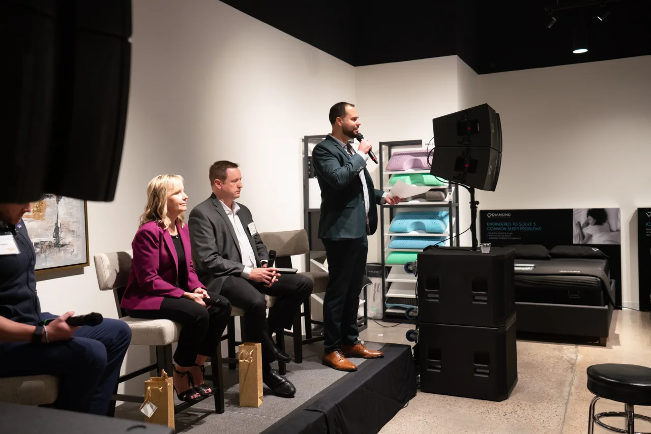A photo of Jeremy Roberts, Laurie Oswald, Matt Clark, and Garrett Mintz