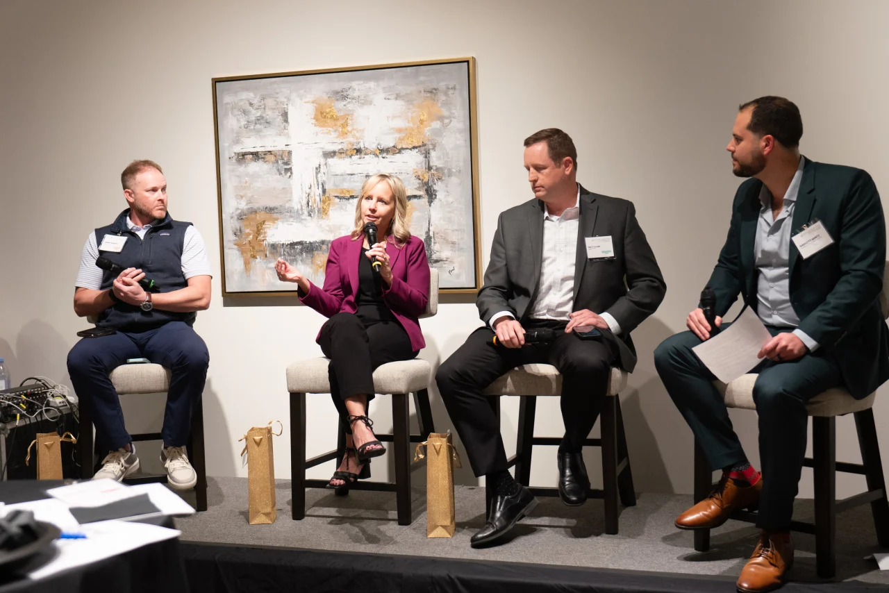 A photo of Jeremy Roberts, Laurie Oswald, Matt Clark, and Garrett Mintz
