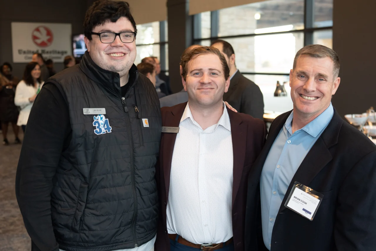 A photo of Jay Seline, Aaron Verwold, and Brian Cook