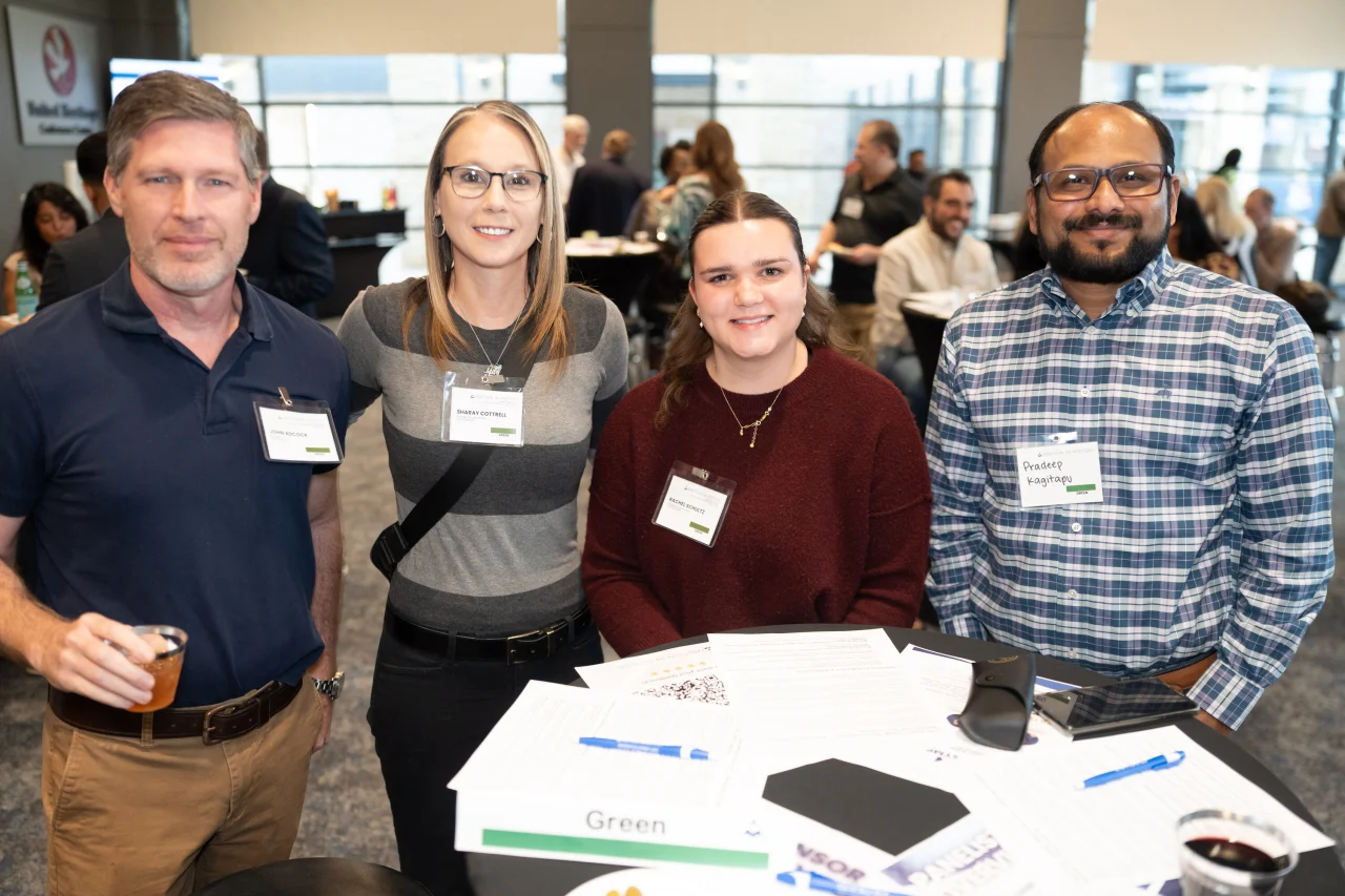 A photo of John Adcock, Sharay Cottrell, Rachel Schultz, Pradeep Kagitapu