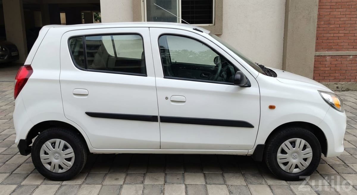 Maruti Alto 2010 CNG – White Hatchback - Cars - Ahmedabad City - Image 1