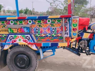Colorful Cargo Auto Rickshaw with Open Loader Colorful Cargo Auto Rickshaw with Open Loader