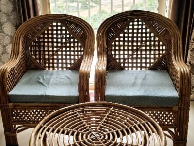 Cane chairs and tea table
