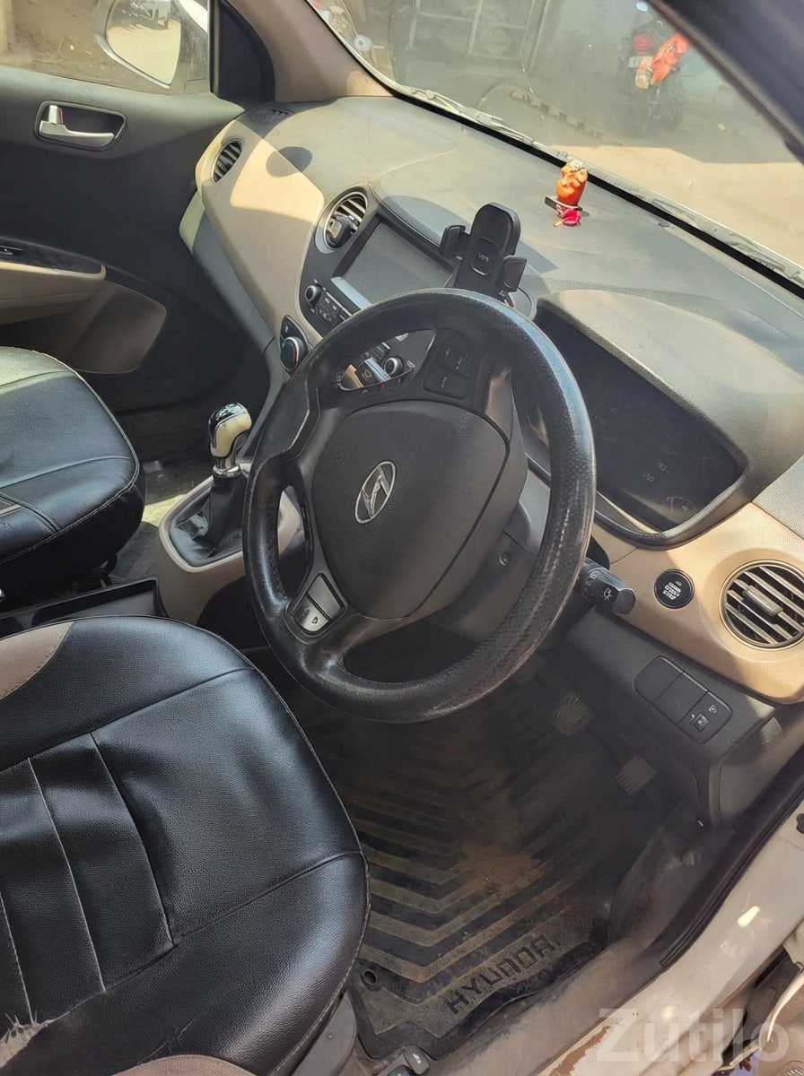 White Compact Sedan with Alloy Wheels - કાર - અમદાવાદ શહેર - Image 2