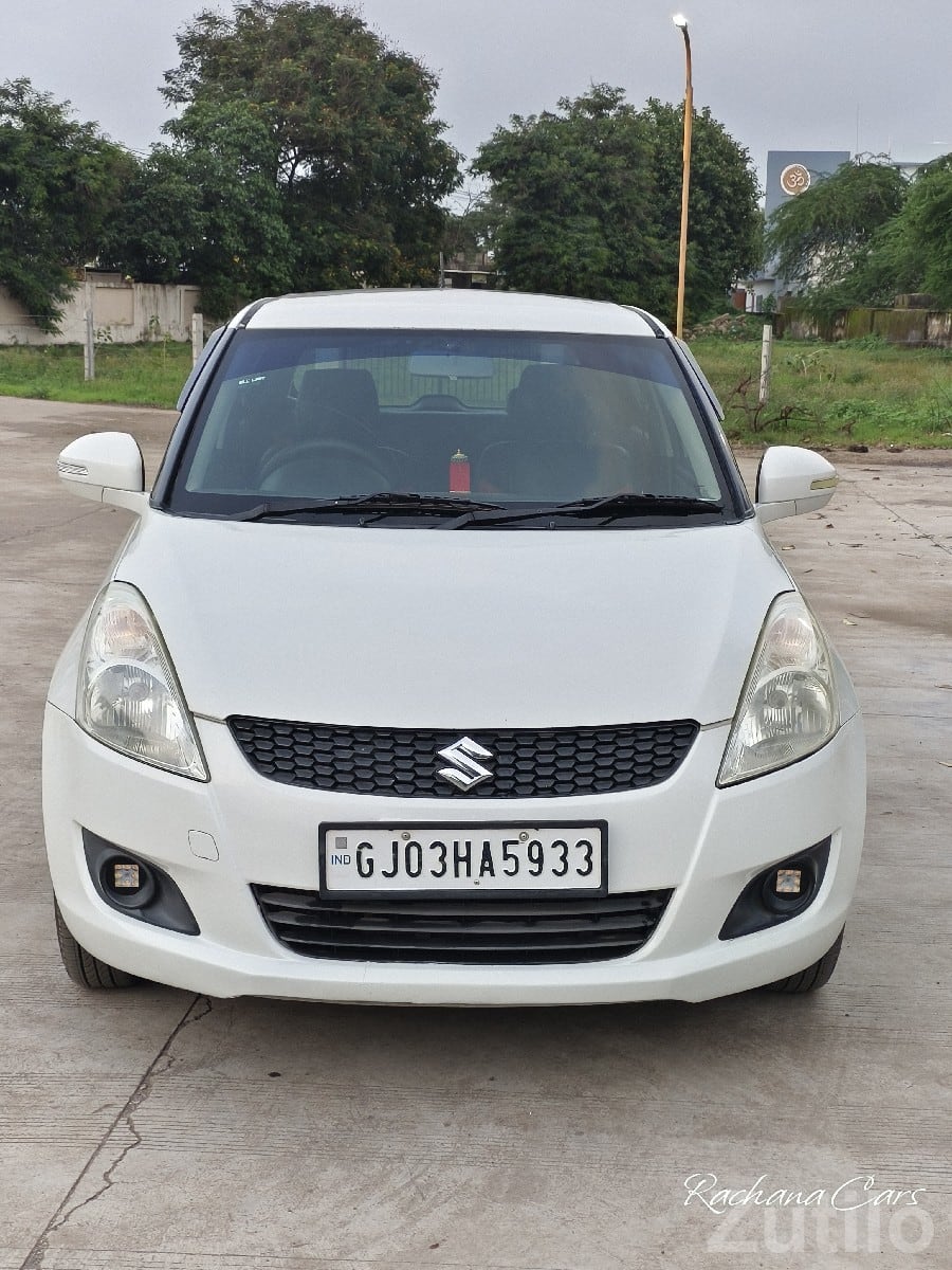 White Maruti Swift VXI – Well Maintained