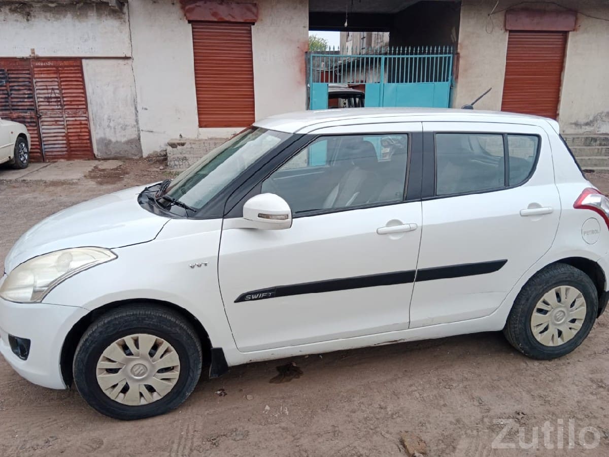 White Maruti Swift VDI Diesel Hatchback