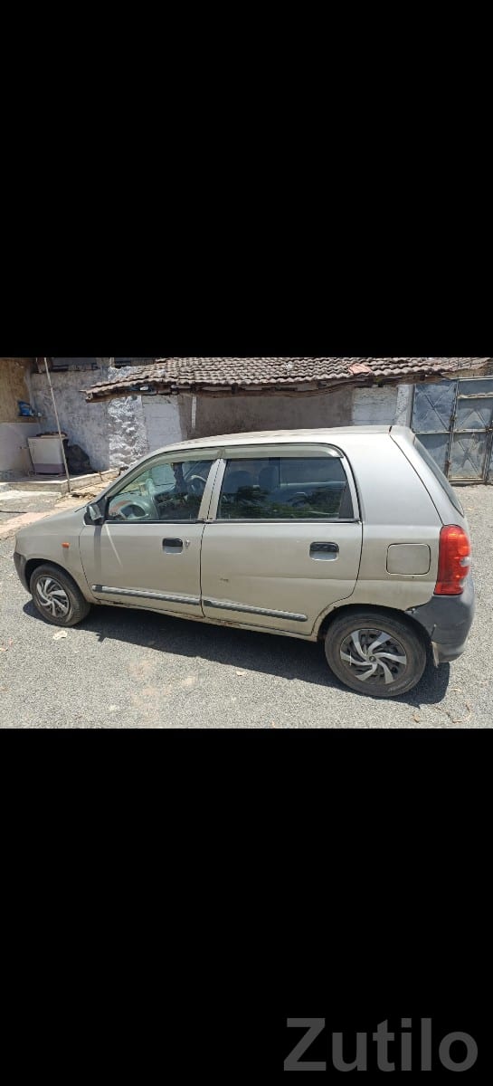 2006 Small Family Car – Beige Hatchback