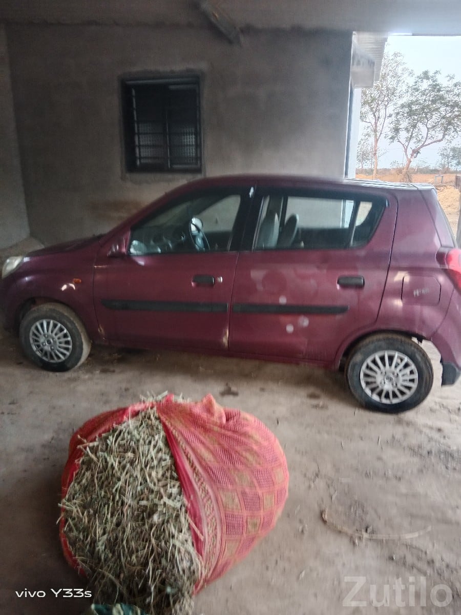 2013 Maroon Small Car with New Tyres 2013 Maroon Small Car with New Tyres