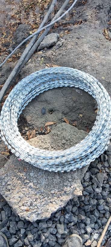 Barbed Wire Fencing Work and Wire Roll