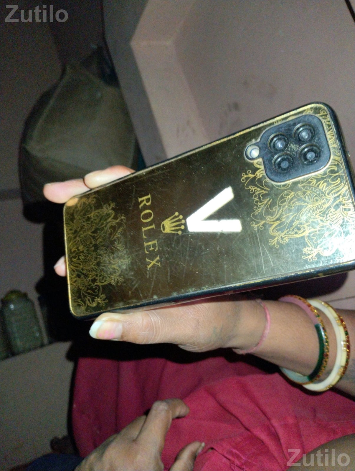 Smartphone with Rolex Gold Back Cover