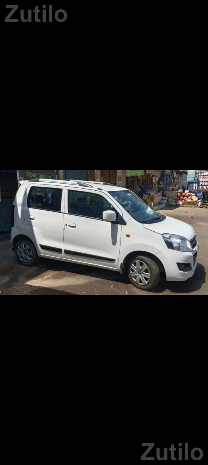 Maruti Suzuki WagonR VXI White - કાર - દસ્ક્રોઇ - Image 3