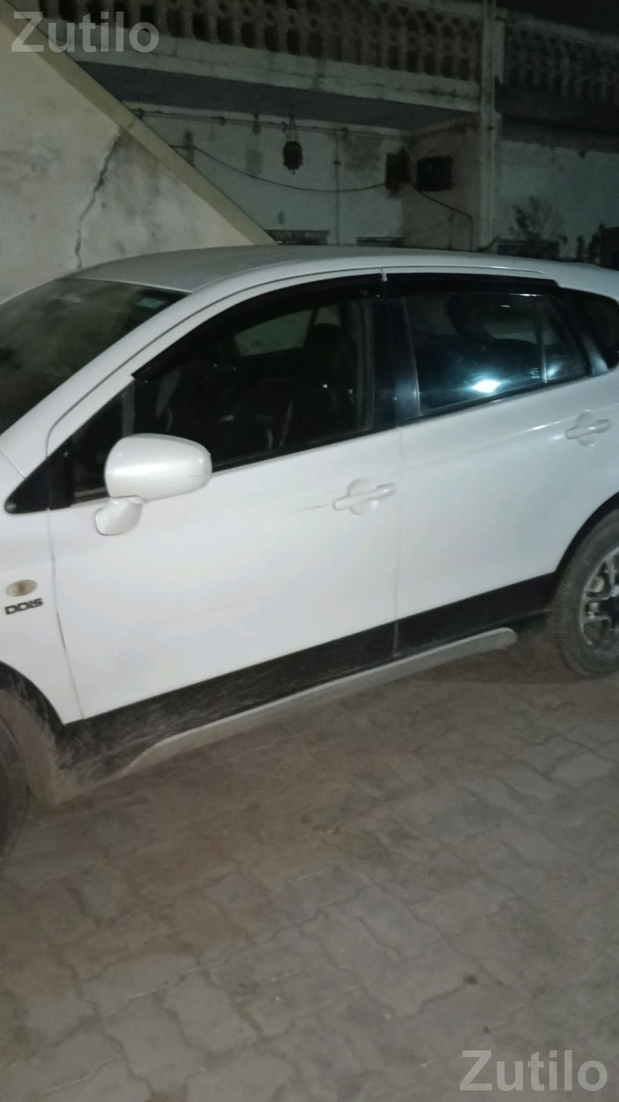 White Maruti Suzuki Ertiga Diesel Car