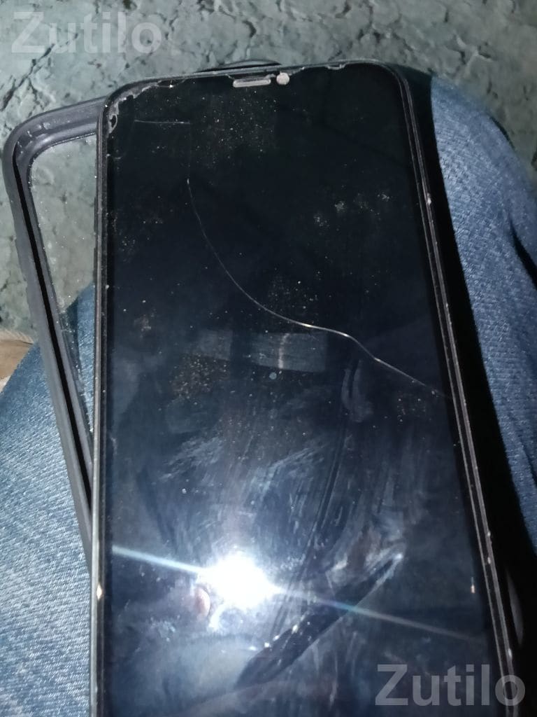 Apple iPhone Smartphone with Cracked Screen