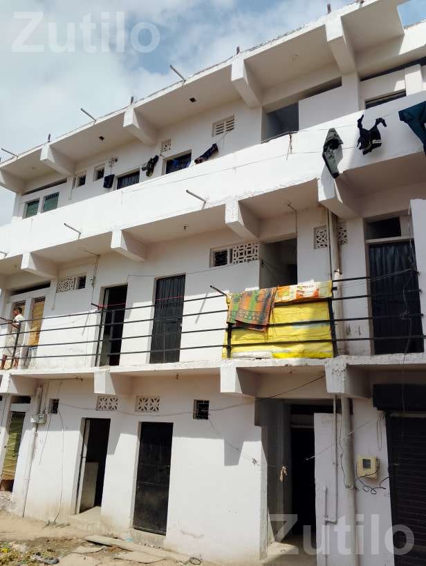 Colony Building with House and Shop for Sale
