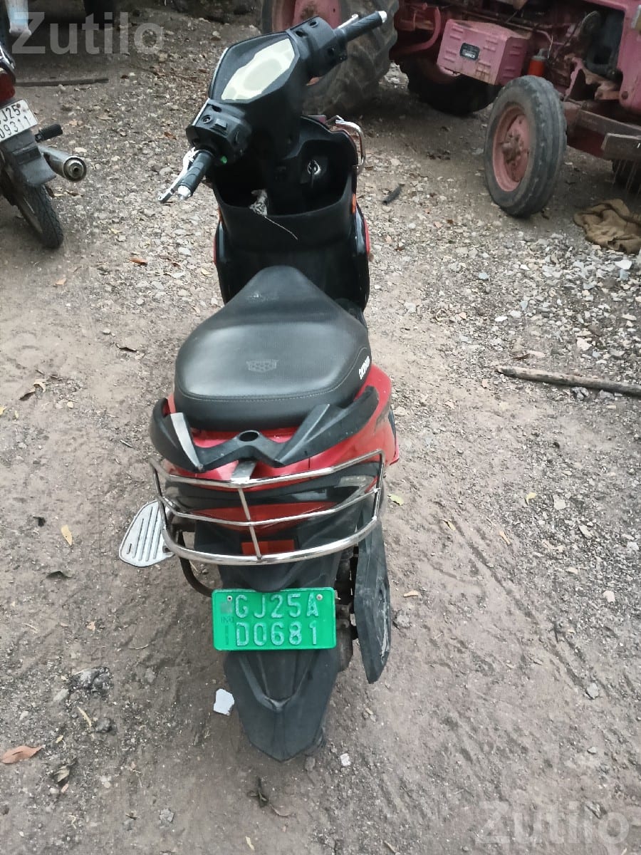 Red Electric Scooty, Single Owner Red Electric Scooty, Single Owner