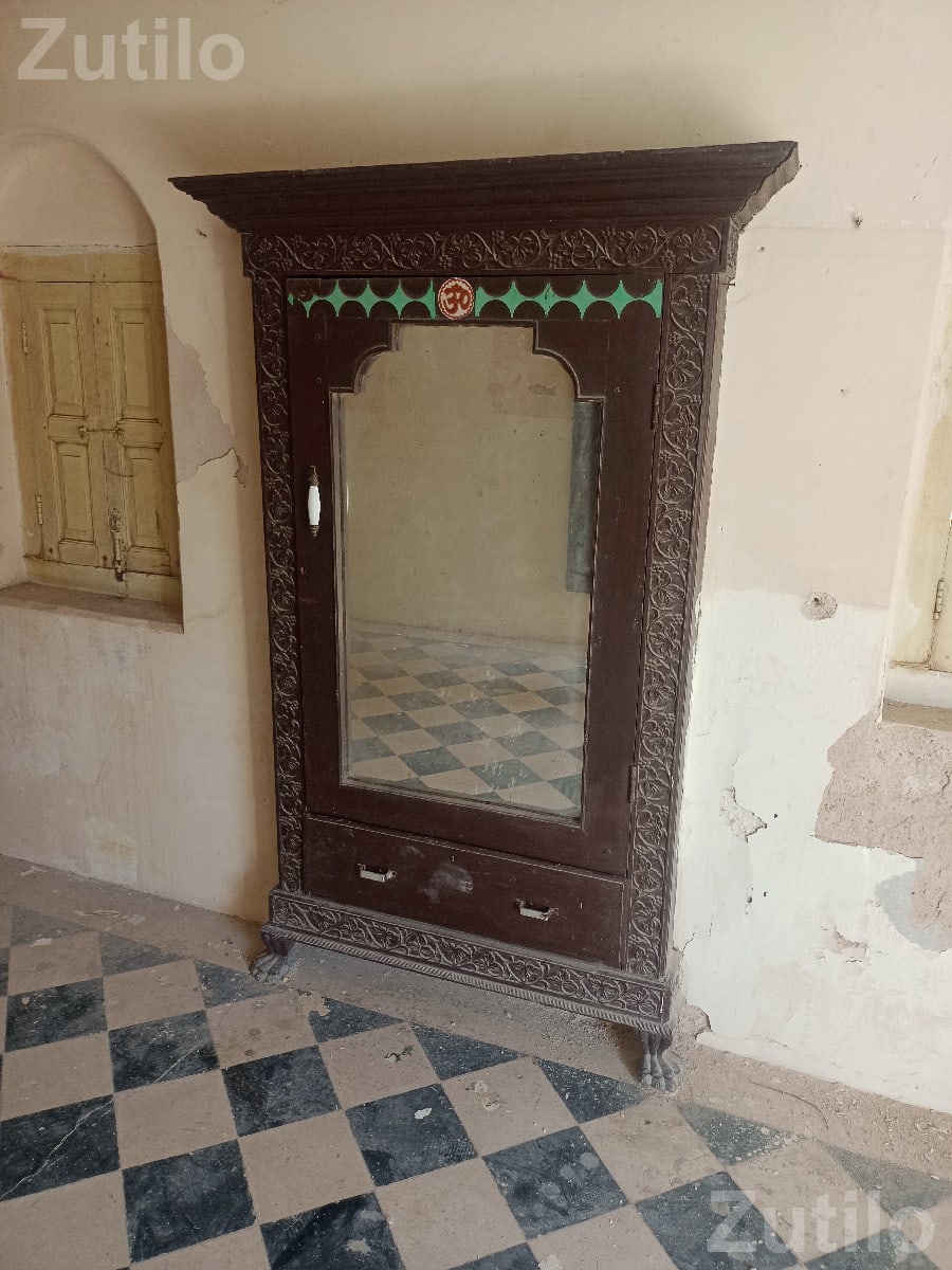 Carved Wooden Wardrobe with Mirror and Drawer