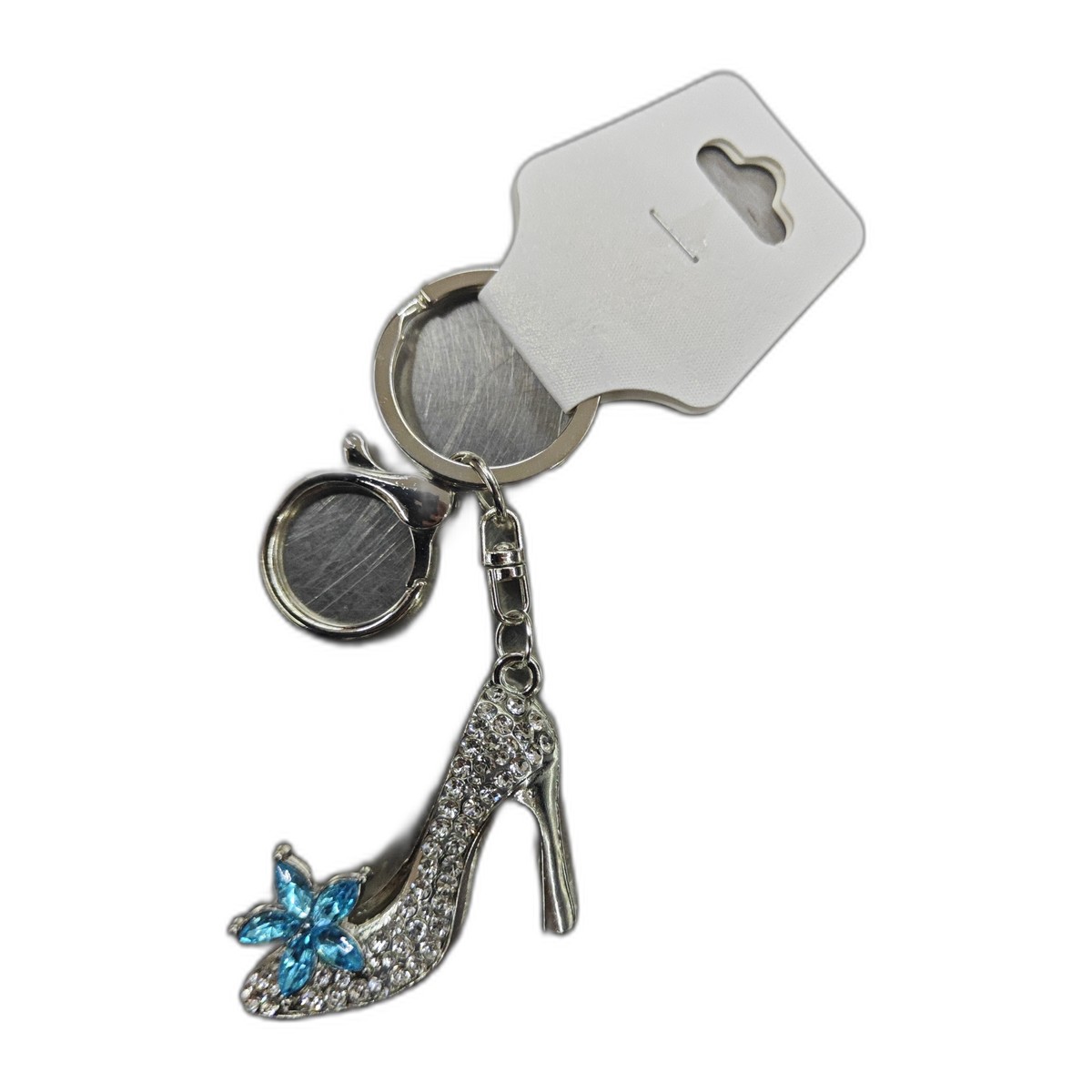 Porte-clés chaussure à talon argentée avec strass et fleur bleue