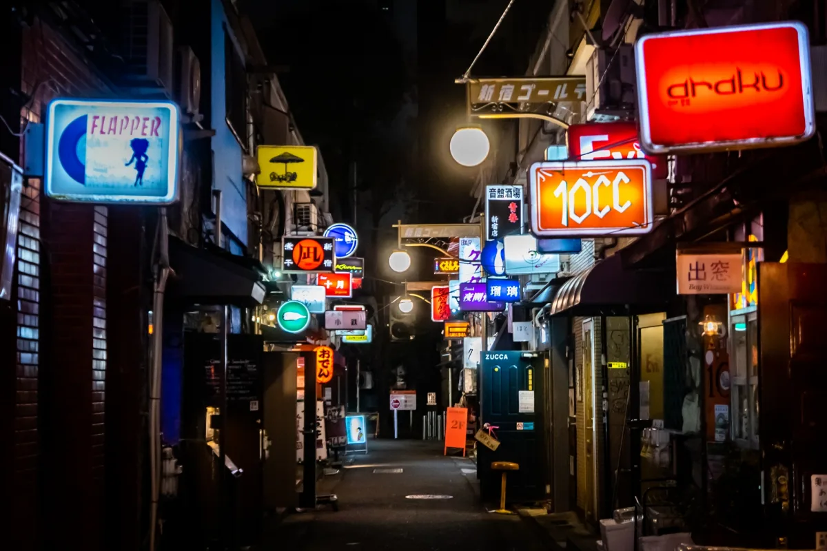 Neon signs in Shinkuku Golden Gai alley in Tokyo